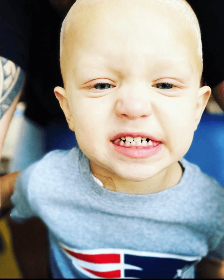 Nicholas in his Patriots shirt, showing his spirited personality